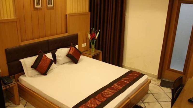 Hotel Apra Deluxe Neu-Delhi Zimmer foto